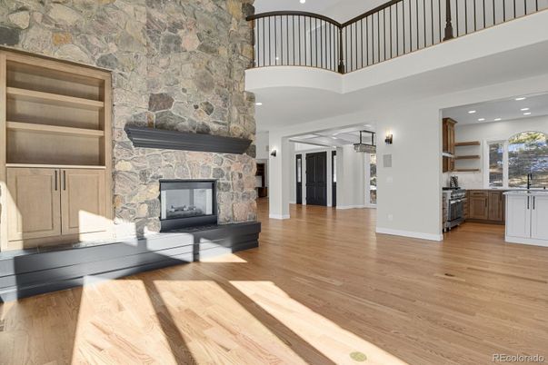 Fireplace, Interior, Kitchen, Recessed Lighting, Stone Walls, Wood Texture Flooring