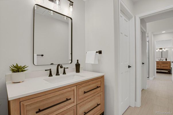 Bathroom, Dual Sink Vanities, Interior, Recessed Lighting, Wood Texture Flooring