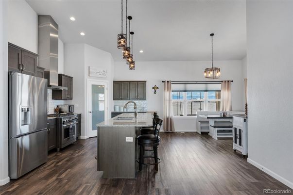 Dining room, Interior, Kitchen, Living room, Pendant Lights, Recessed Lighting, Stainless Steel Appliances, Wood Texture Flooring