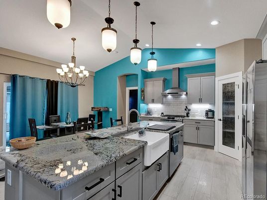 Chandelier, Dining room, Interior, Kitchen, Pendant Lights, Recessed Lighting, Stainless Steel Appliances, Wood Texture Flooring