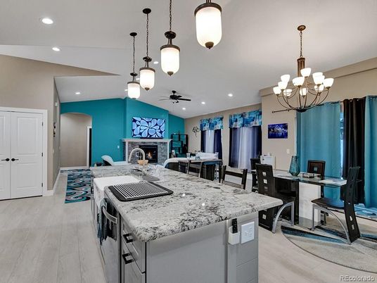 Chandelier, Dining room, Fireplace, Interior, Kitchen, Living room, Pendant Lights, Recessed Lighting, Wood Texture Flooring