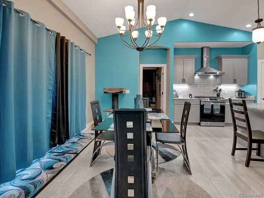 Chandelier, Dining room, Interior, Kitchen, Pendant Lights, Recessed Lighting, Stainless Steel Appliances, Wood Texture Flooring