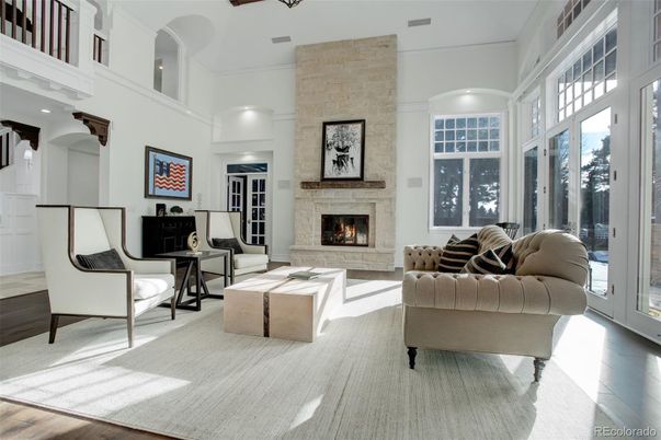 Fireplace, Interior, Living room, Recessed Lighting, Stone Walls, Wood Texture Flooring