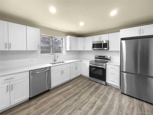 Interior, Kitchen, Recessed Lighting, Stainless Steel Appliances, Wood Texture Flooring