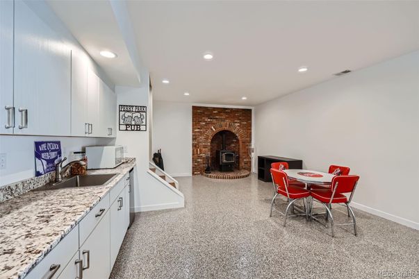Dining room, Fireplace, Interior, Recessed Lighting, Stone Walls