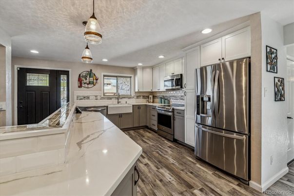 Interior, Kitchen, Pendant Lights, Recessed Lighting, Stainless Steel Appliances, Wood Texture Flooring