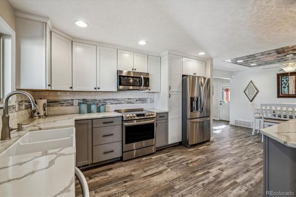 Interior, Kitchen, Recessed Lighting, Stainless Steel Appliances, Wood Texture Flooring