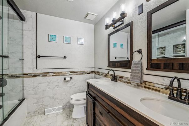 Bathroom, Dual Sink Vanities, Glass Shower, Interior, Marble, Marble Walls