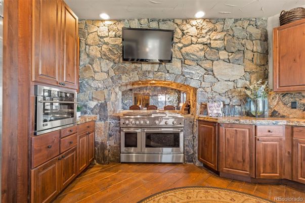Interior, Kitchen, Recessed Lighting, Stainless Steel Appliances, Stone Walls, Wood Texture Flooring