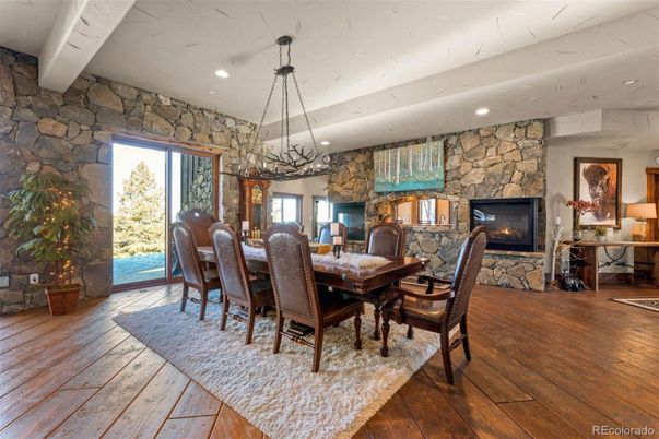 Dining room, Fireplace, Interior, Pendant Lights, Recessed Lighting, Stone Walls, Wood Texture Flooring