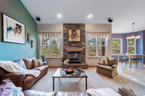 Dining room, Fireplace, Interior, Living room, Pendant Lights, Recessed Lighting, Stone Walls, Wood Texture Flooring