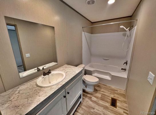 Bathroom, Dual Sink Vanities, Interior, Recessed Lighting, Wood Texture Flooring