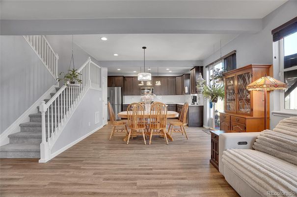 Dining room, Interior, Kitchen, Pendant Lights, Recessed Lighting, Stainless Steel Appliances, Wood Texture Flooring