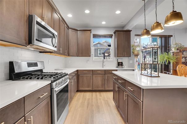 Interior, Kitchen, Pendant Lights, Recessed Lighting, Stainless Steel Appliances, Wood Texture Flooring