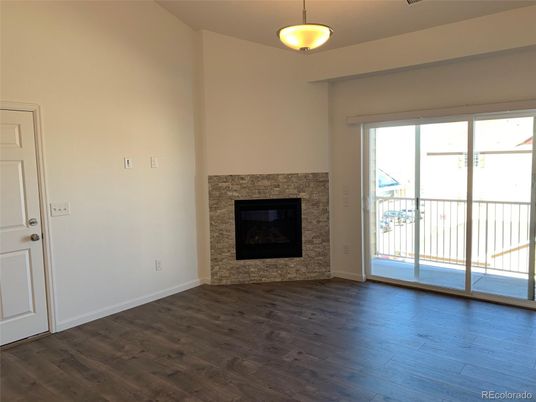 Empty room, Fireplace, Interior, Pendant Lights, Wood Texture Flooring