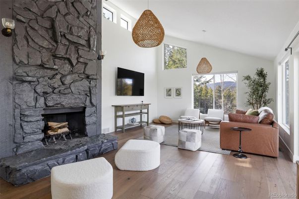 Fireplace, Interior, Living room, Pendant Lights, Stone Walls, Wood Texture Flooring