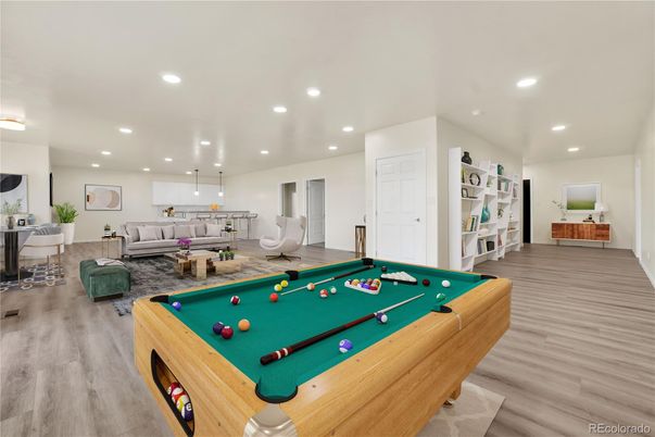 Billiard Table, Game Room, Interior, Living room, Pendant Lights, Recessed Lighting, Wood Texture Flooring