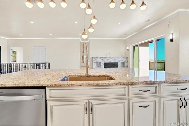Fireplace, Interior, Kitchen, Pendant Lights, Recessed Lighting, Stainless Steel Appliances