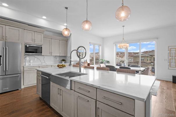 Dining room, Interior, Kitchen, Pendant Lights, Recessed Lighting, Stainless Steel Appliances, Wood Texture Flooring