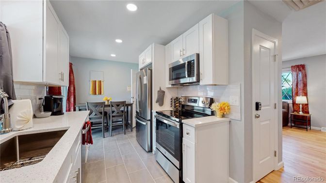 Dining room, Interior, Kitchen, Recessed Lighting, Stainless Steel Appliances, Wood Texture Flooring