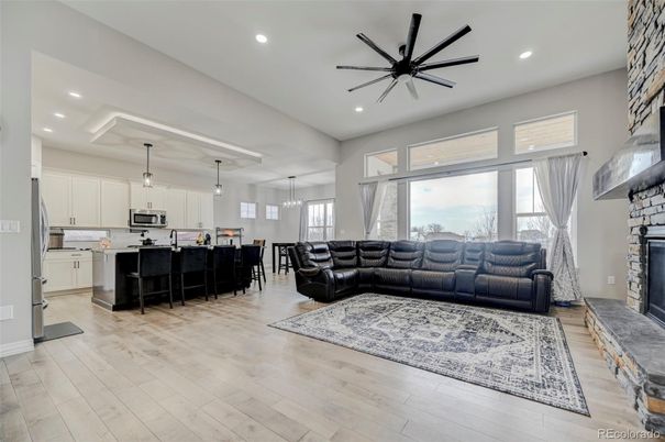 Dining room, Fireplace, Interior, Kitchen, Living room, Pendant Lights, Recessed Lighting, Stainless Steel Appliances, Wood Texture Flooring
