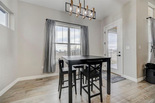 Dining room, Interior, Pendant Lights, Wood Texture Flooring