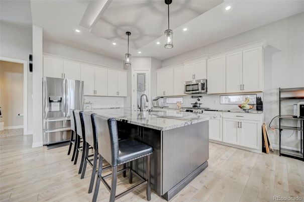 Interior, Kitchen, Pendant Lights, Recessed Lighting, Stainless Steel Appliances, Wood Texture Flooring
