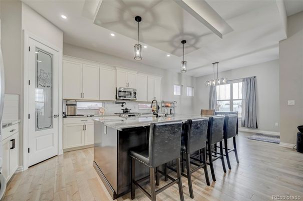 Interior, Kitchen, Pendant Lights, Recessed Lighting, Stainless Steel Appliances, Wood Texture Flooring