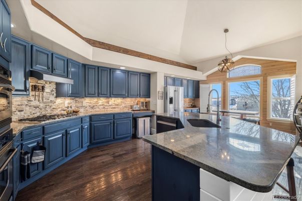Chandelier, Interior, Kitchen, Pendant Lights, Recessed Lighting, Stainless Steel Appliances, Wood Texture Flooring