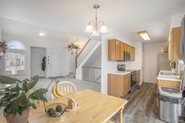 Chandelier, Interior, Kitchen, Pendant Lights, Stainless Steel Appliances, Wood Texture Flooring