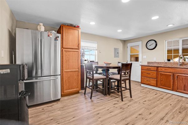 Dining room, Interior, Kitchen, Recessed Lighting, Stainless Steel Appliances, Wood Texture Flooring