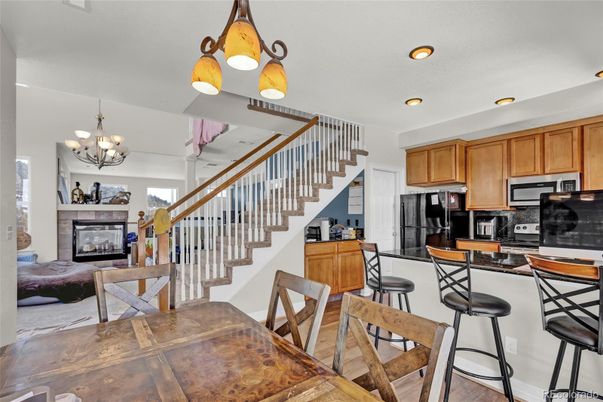 Chandelier, Dining room, Fireplace, Interior, Kitchen, Pendant Lights, Recessed Lighting, Wood Texture Flooring