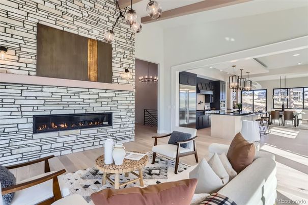 Dining room, Fireplace, Interior, Kitchen, Living room, Pendant Lights, Recessed Lighting, Stainless Steel Appliances, Stone Walls, Wood Texture Flooring