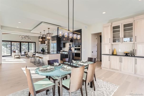 Chandelier, Dining room, Interior, Kitchen, Pendant Lights, Recessed Lighting, Stainless Steel Appliances, Wood Texture Flooring
