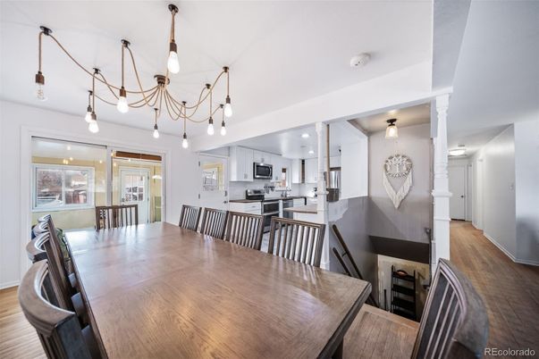 Dining room, Interior, Kitchen, Pendant Lights, Recessed Lighting, Stainless Steel Appliances, Wood Texture Flooring