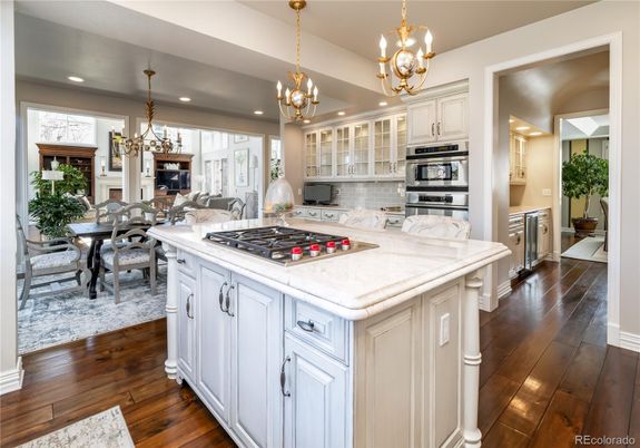 Chandelier, Dining room, Interior, Kitchen, Recessed Lighting, Stainless Steel Appliances, Wood Texture Flooring
