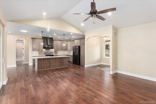 Empty room, Interior, Kitchen, Pendant Lights, Recessed Lighting, Stainless Steel Appliances, Wood Texture Flooring