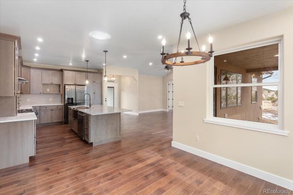 Chandelier, Interior, Kitchen, Pendant Lights, Recessed Lighting, Stainless Steel Appliances, Wood Texture Flooring