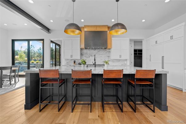 Interior, Kitchen, Marble Walls, Pendant Lights, Recessed Lighting, Wood Texture Flooring
