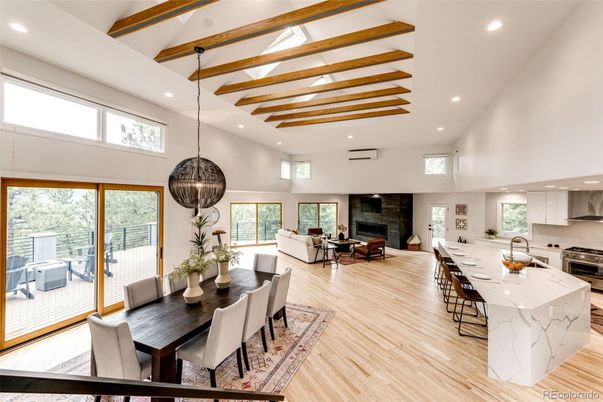 Dining room, Fireplace, Interior, Kitchen, Living room, Pendant Lights, Recessed Lighting, Stainless Steel Appliances, Wooden Beams, Wood Texture Flooring