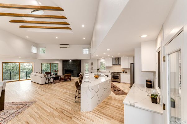 Dining room, Interior, Kitchen, Living room, Recessed Lighting, Stainless Steel Appliances, Wood Texture Flooring