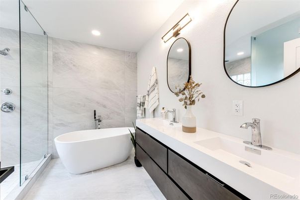 Bathroom, Dual Sink Vanities, Free Standing Baths, Glass Shower, Interior, Marble, Marble Walls, Recessed Lighting