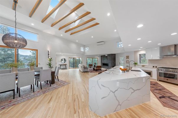 Dining room, Fireplace, Interior, Kitchen, Living room, Pendant Lights, Recessed Lighting, Stainless Steel Appliances, Wood Texture Flooring