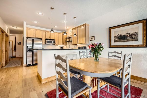 Dining room, Interior, Kitchen, Pendant Lights, Recessed Lighting, Stainless Steel Appliances, Wood Texture Flooring