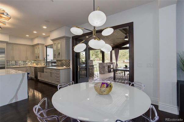 Dining room, Interior, Kitchen, Pendant Lights, Recessed Lighting, Stainless Steel Appliances, Wood Texture Flooring