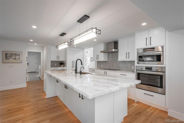 Interior, Kitchen, Pendant Lights, Recessed Lighting, Stainless Steel Appliances, Wood Texture Flooring