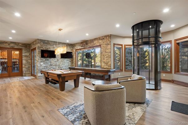Billiard Table, Game Room, Interior, Pendant Lights, Recessed Lighting, Stone Walls, Wood Texture Flooring