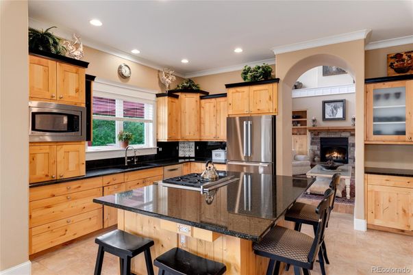 Fireplace, Interior, Kitchen, Recessed Lighting, Stainless Steel Appliances