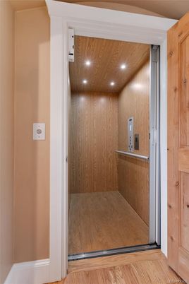 Elevator, Interior, Recessed Lighting, Wooden Ceilings, Wood Texture Flooring, Wooden Walls