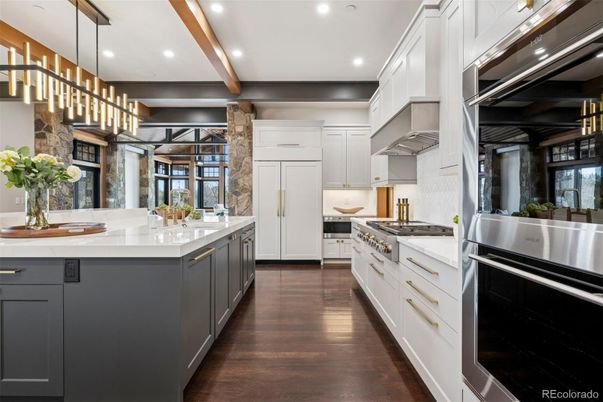 Interior, Kitchen, Pendant Lights, Recessed Lighting, Stainless Steel Appliances, Stone Walls, Wooden Beams, Wood Texture Flooring